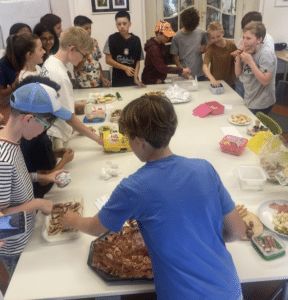 Year 7 enjoyed a Spanish Tapas Lunch, practicing their Spanish food and drink vocabulary and grammar by making and trying their own tapas. ¡Qué rico!