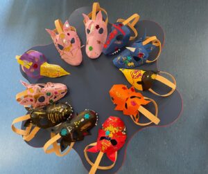 Children at Nessie English Preschool making masks during the summer camp